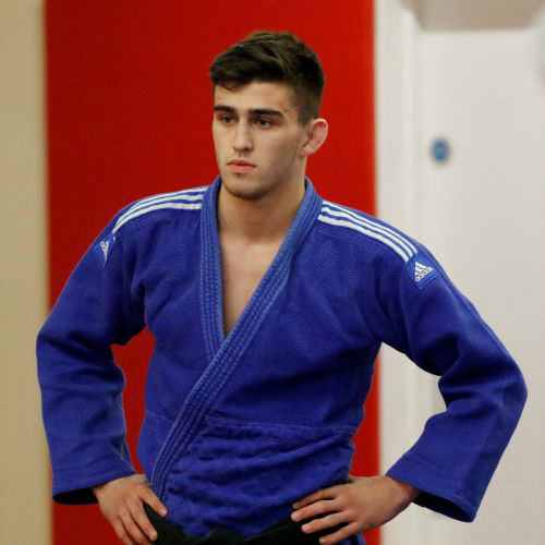 Alex Short (male) judo player in blue outfit