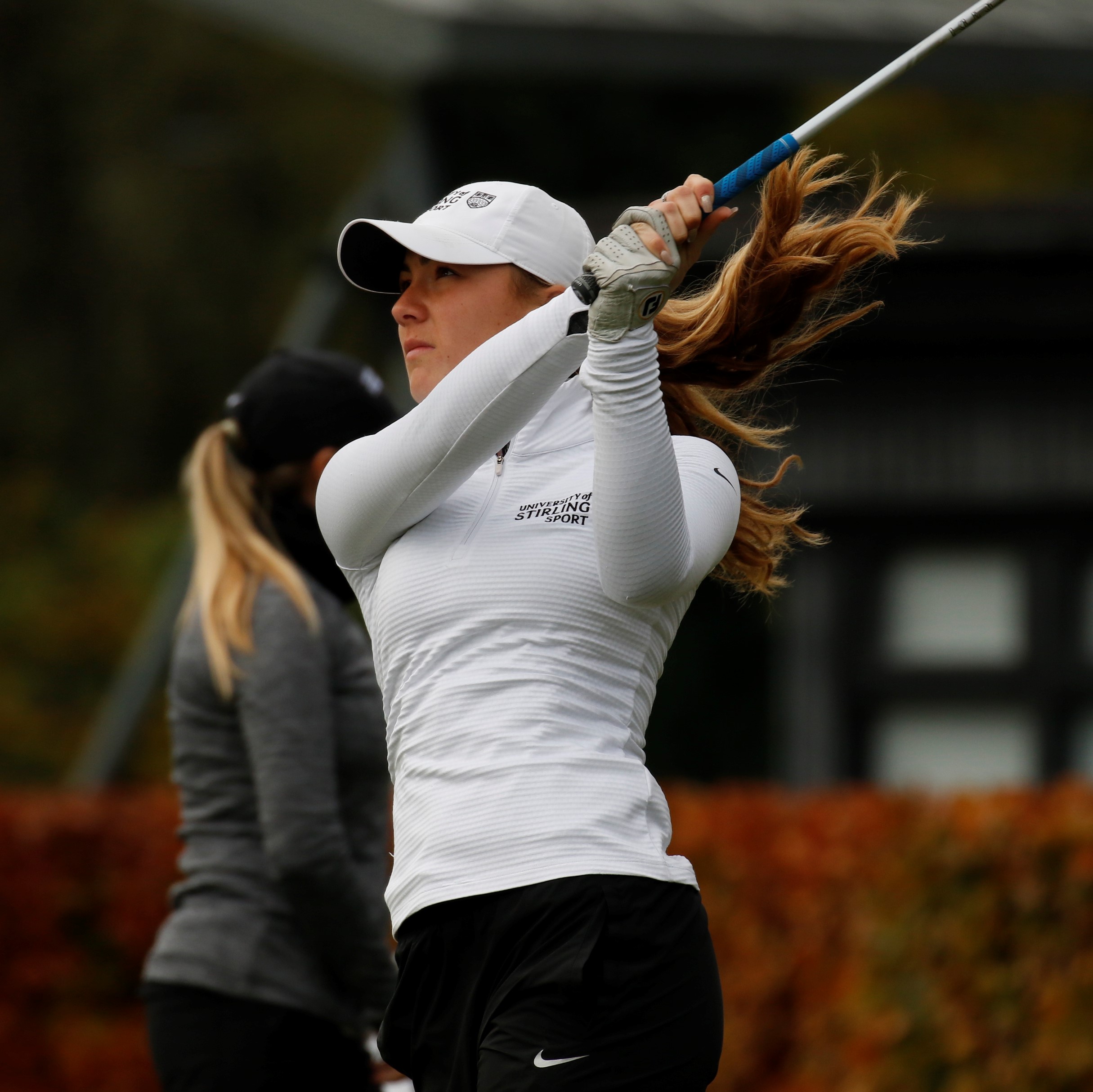 Hazel MacGarvie swinging golf club